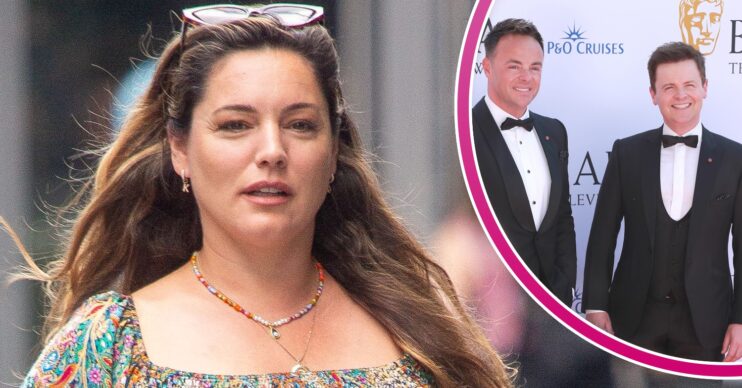 Kelly Brook looks serious and Ant and Dec smiling