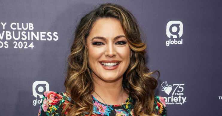Kelly Brook smiles