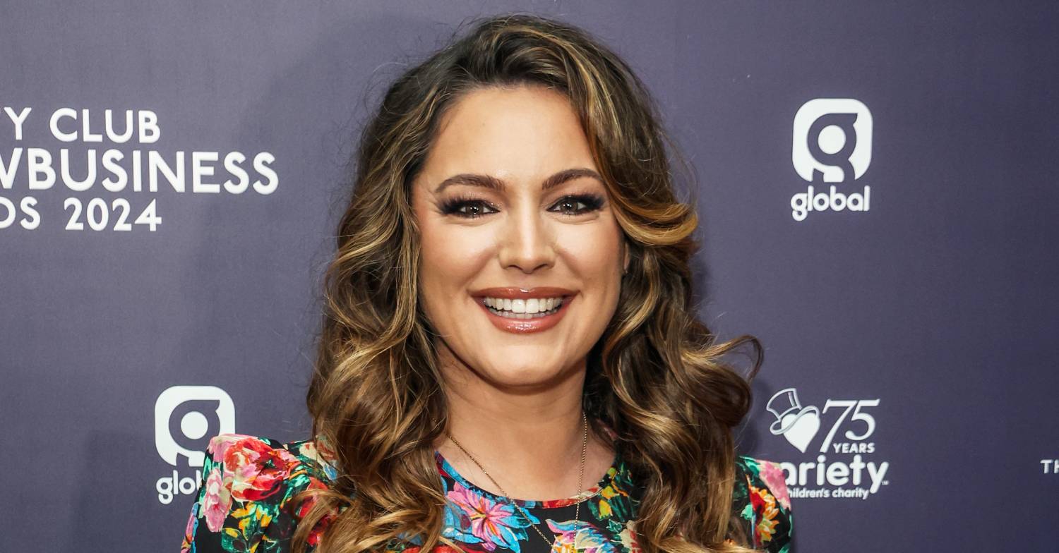 Kelly Brook smiles