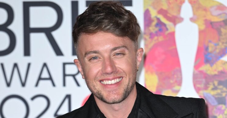 Roman Kemp smiling at the BRIT Awards