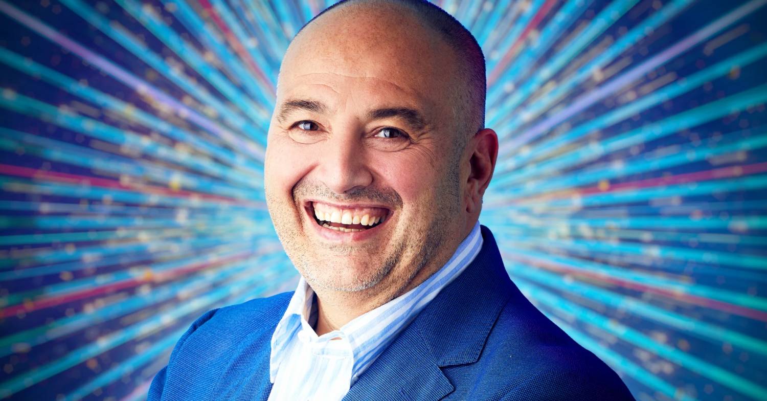Wynne Evans smiles