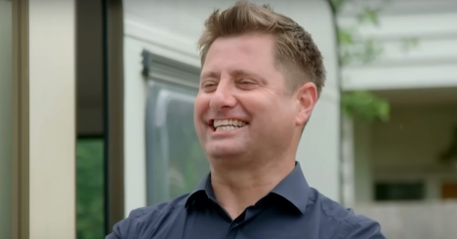 George Clarke talking and smiling