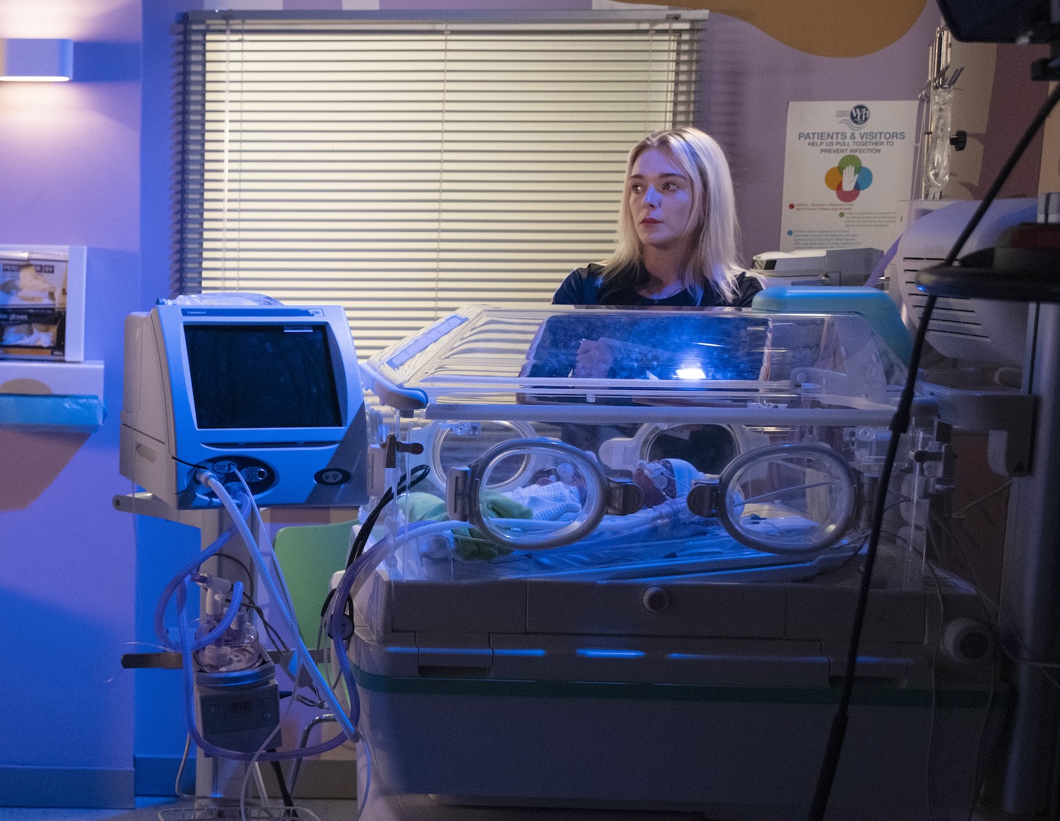 Lauren looks worried in the hospital
