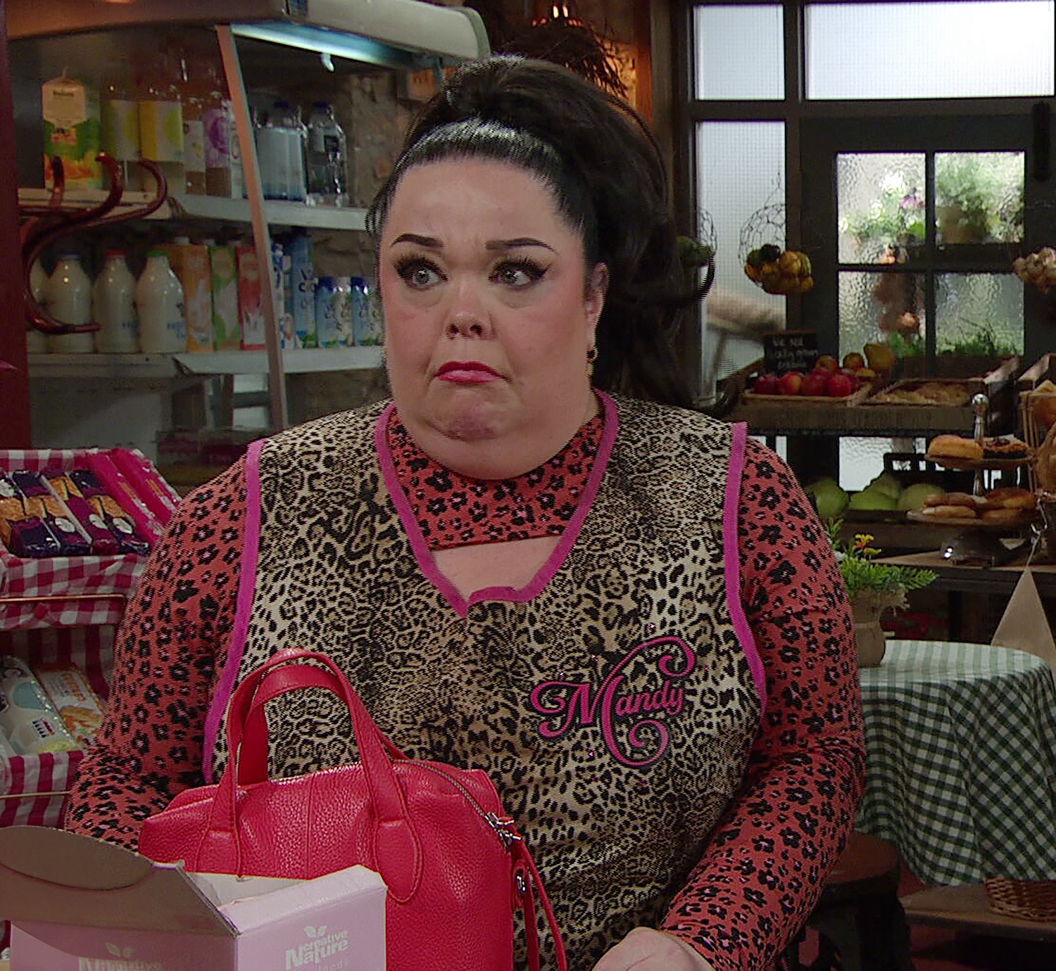 Emmerdale's Mandy looks concerned in the shop