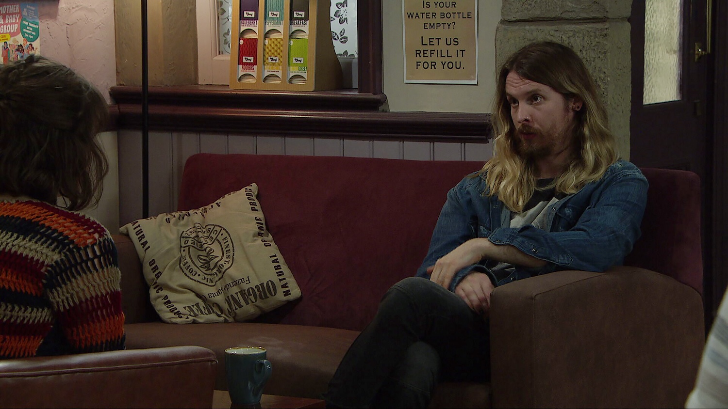 Ryan and Gail are talking in the café