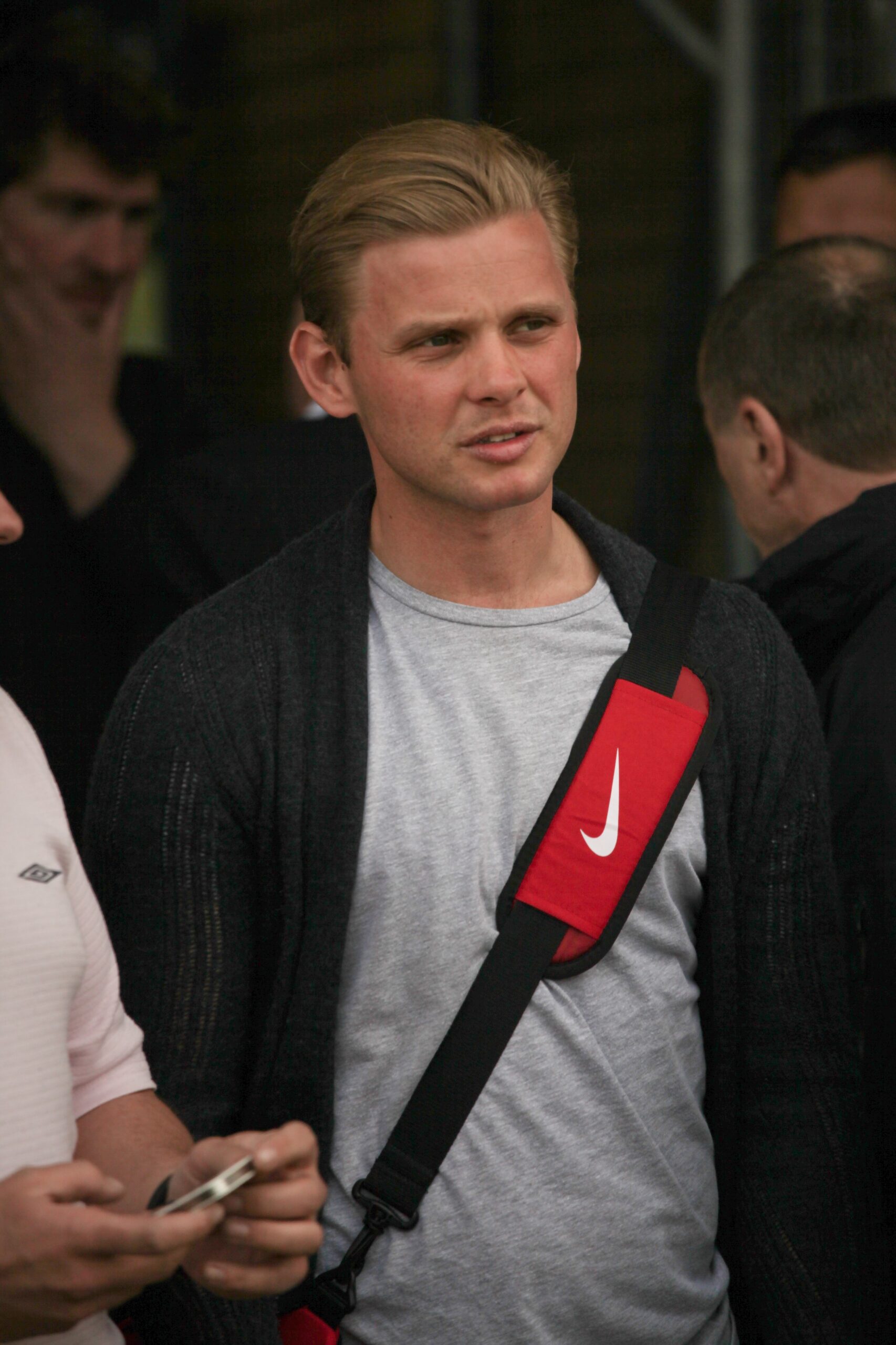 Jeff Brazier with a sports bag across. his body