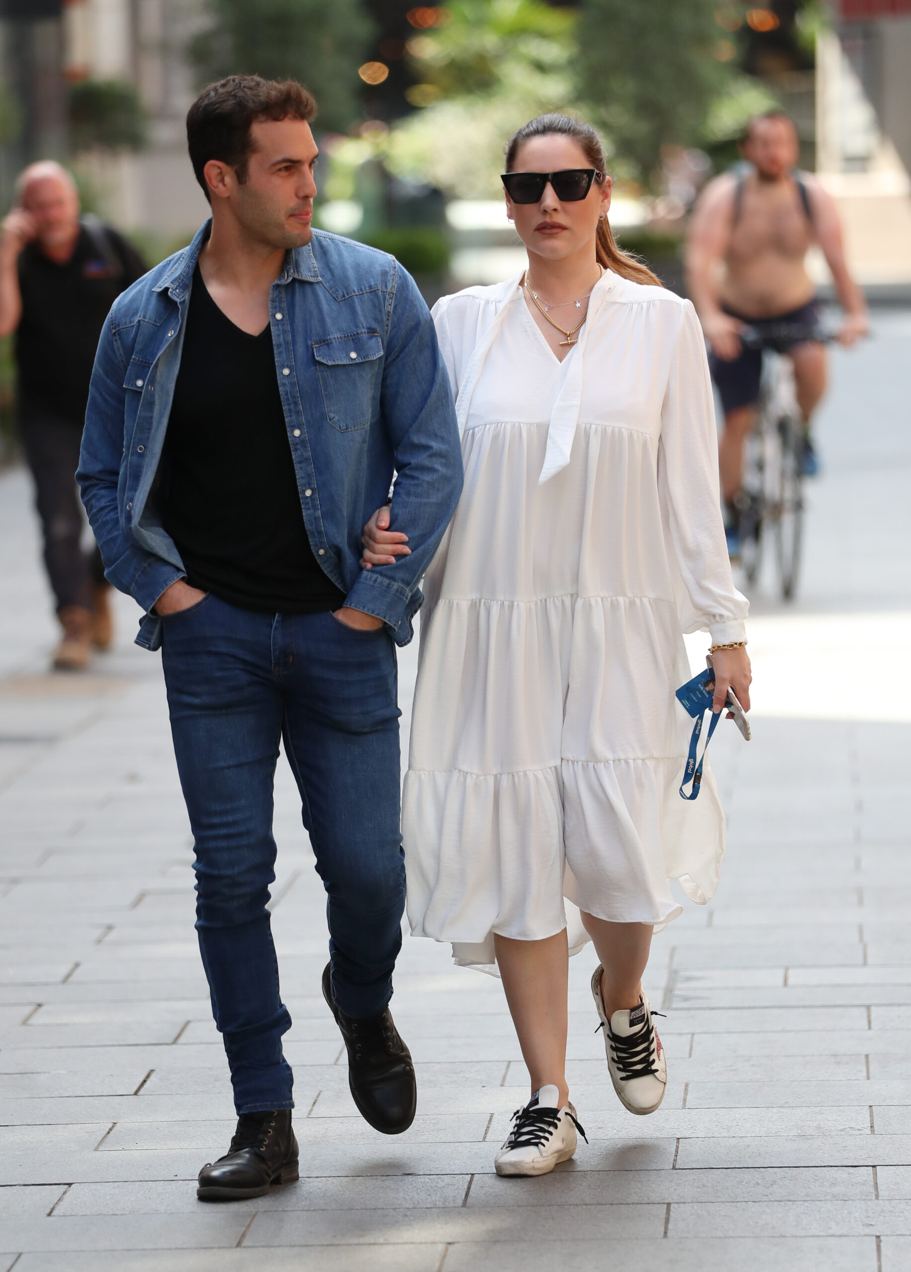 Kelly Brook and Jeremy Parisi walking