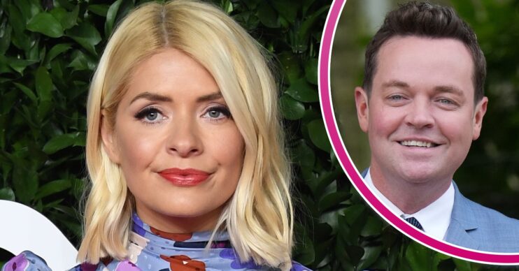 Holly Willoughby smiling and Stephen Mulhern at event
