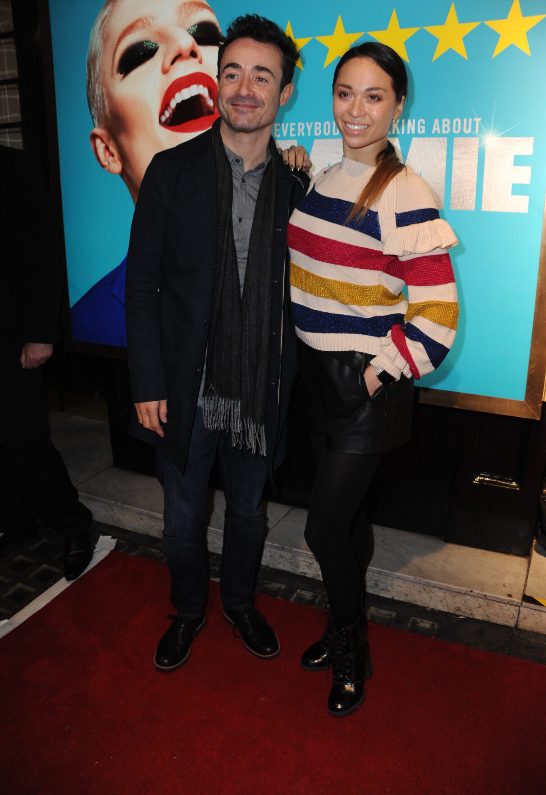 Joe McFadden and Katya Jones smiling at event