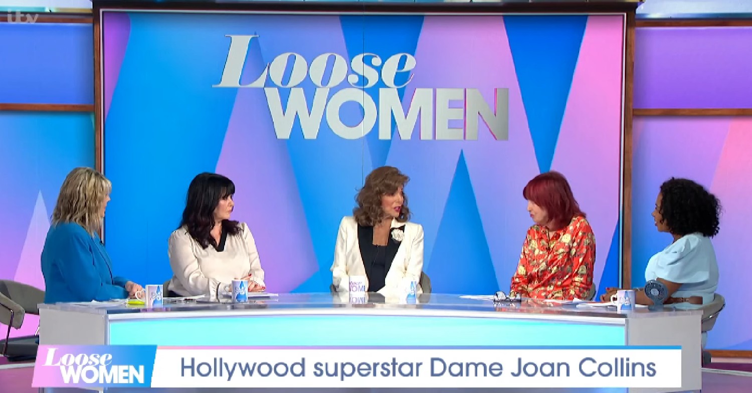 Joan Collins speaking to the panellists on Loose Women