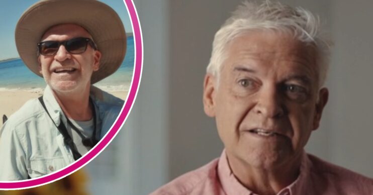 Phillip Schofield in a pink shirt and in a straw hat on the beach
