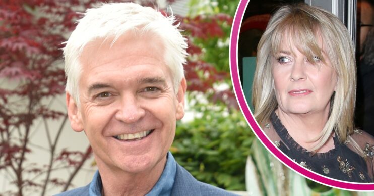 Phillip Schofield smiling at Chelsea Flower Show and wife Stephanie at event