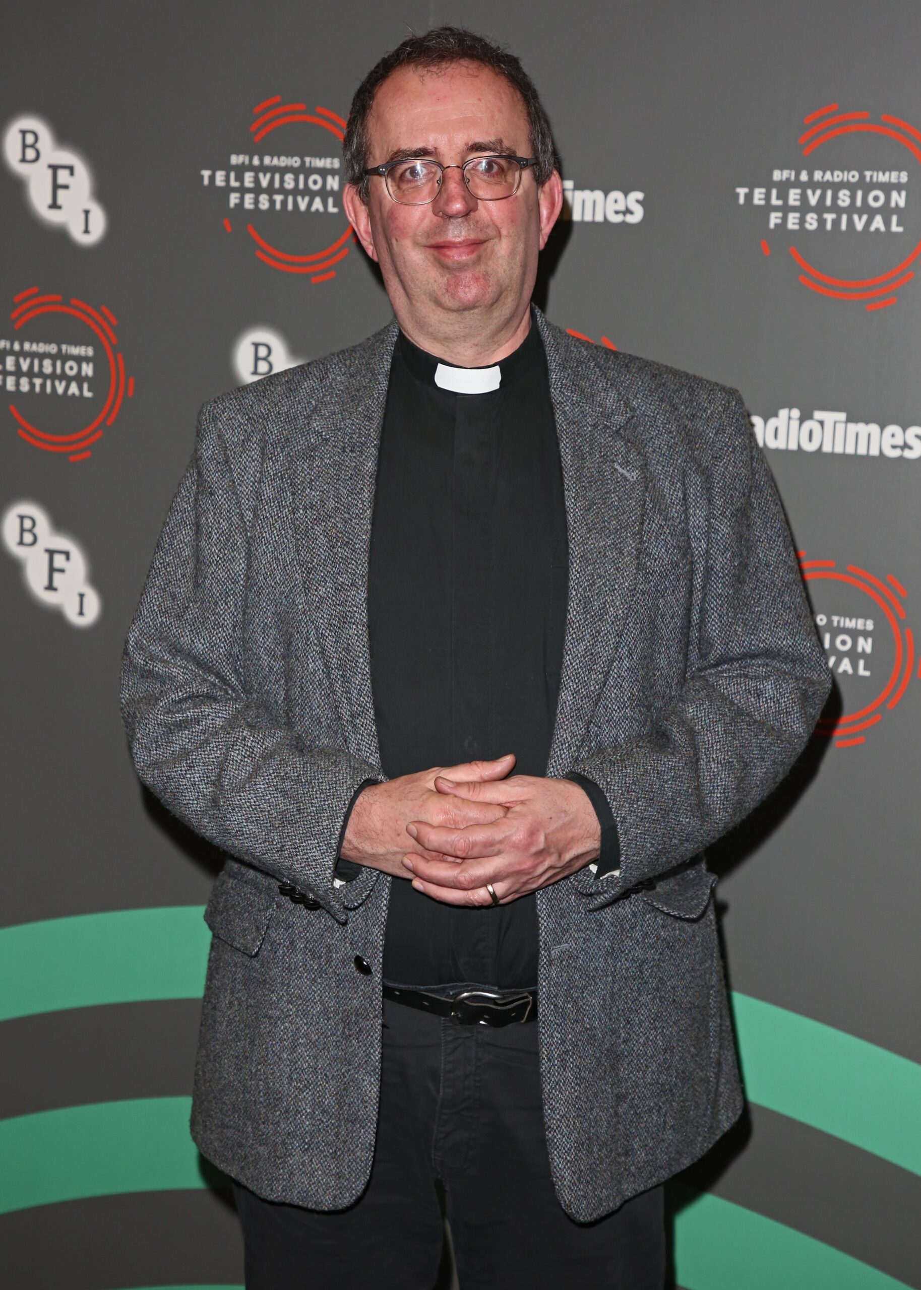 Rev Richard Coles smiling at event