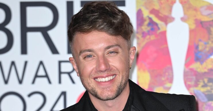 Roman Kemp smiling at the BRITs