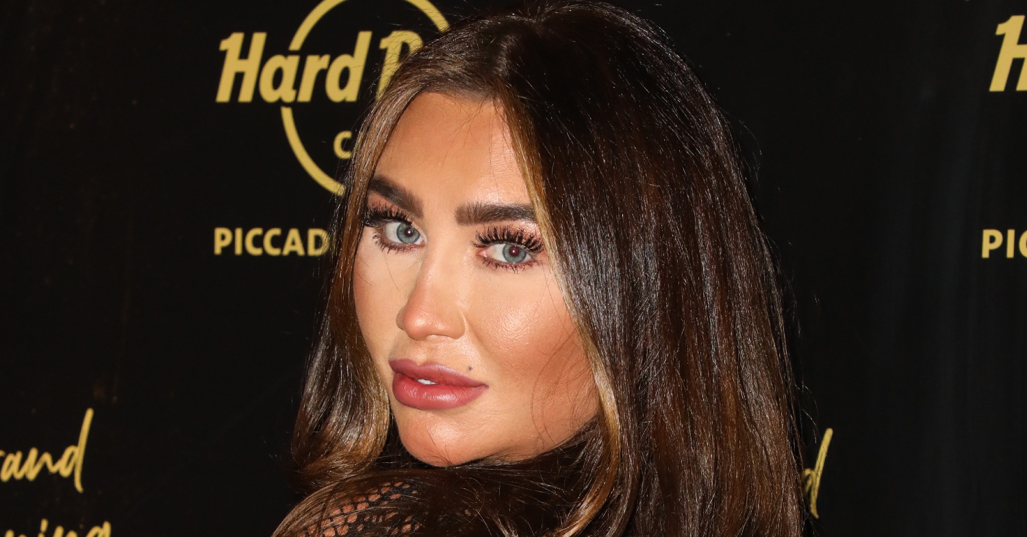 Lauren Goodger turned to the side pouting at the camera
