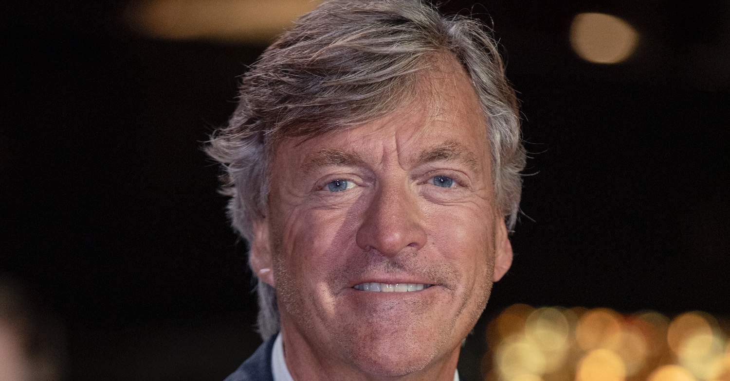 Richard Madeley smiling on the red carpet