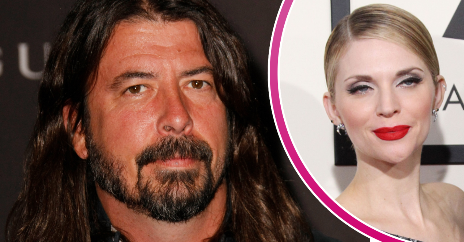 Dave Grohl frowning beside his wife Jordyn Blum