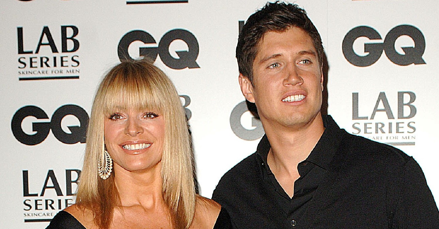 Tess Daly and Vernon Kay posing