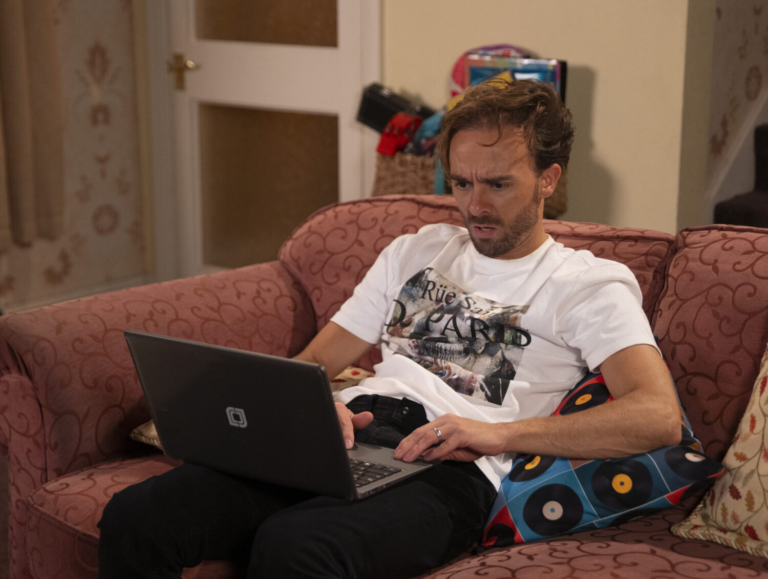 David shocked at laptop