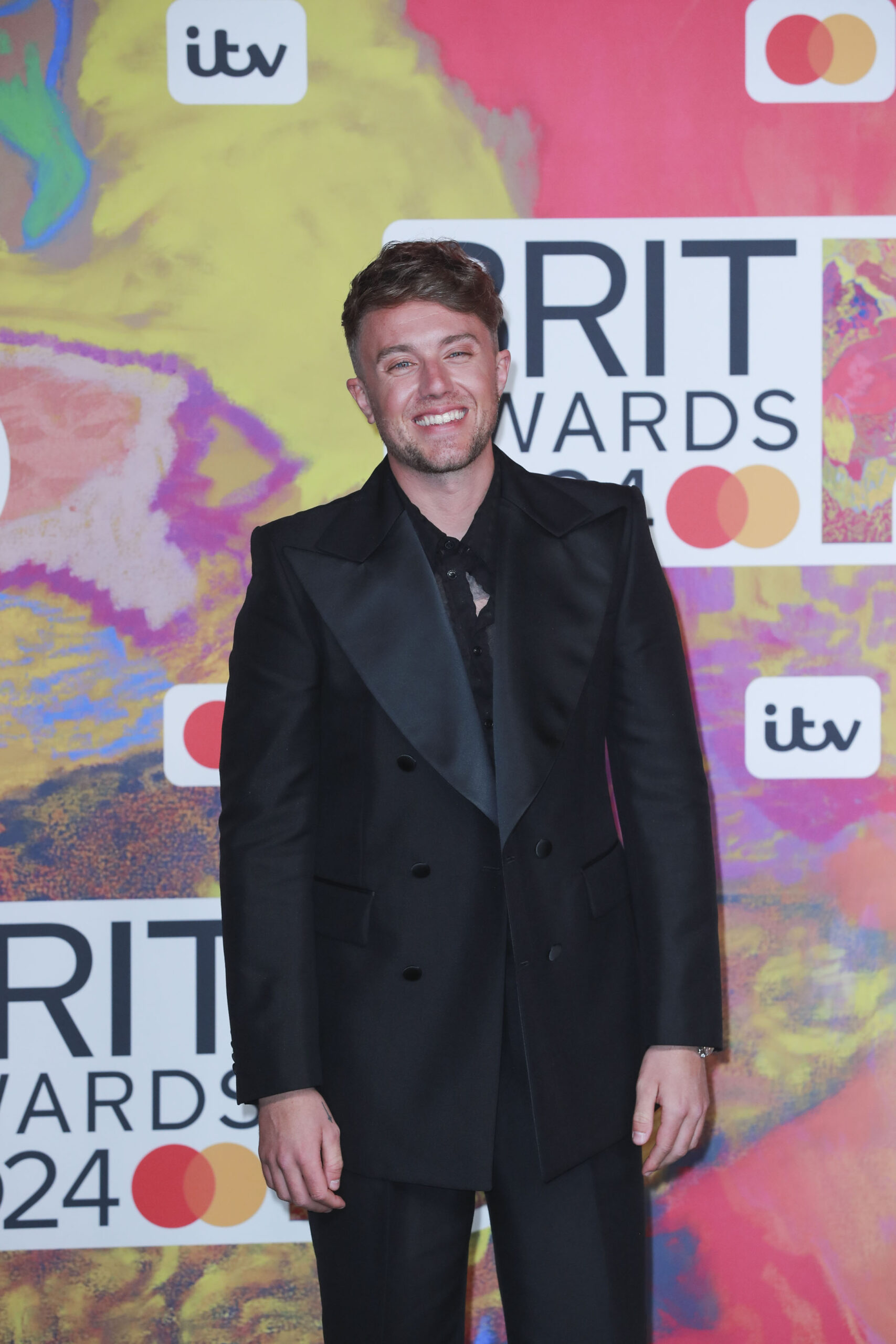Roman Kemp smiling