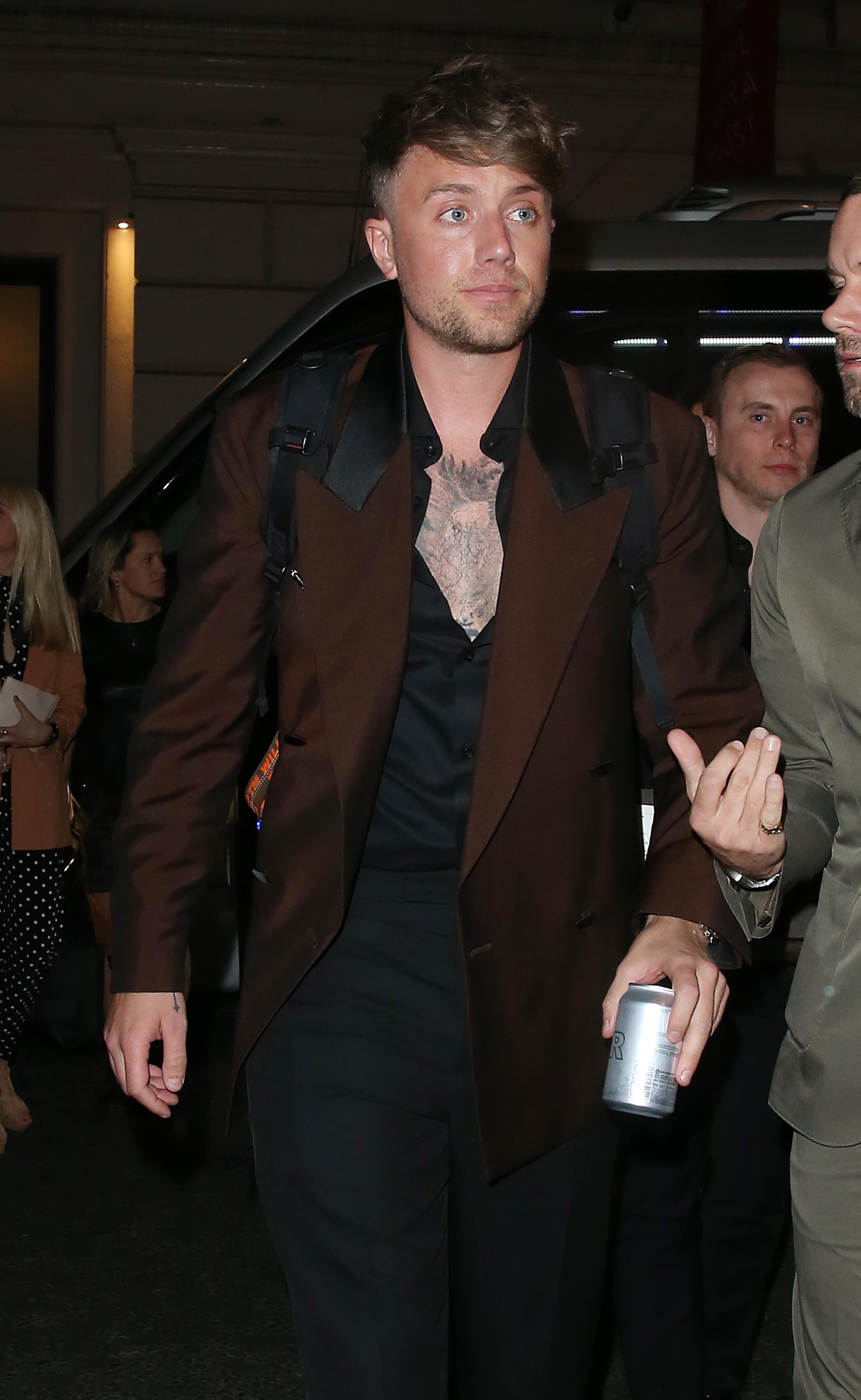 Roman Kemp walking