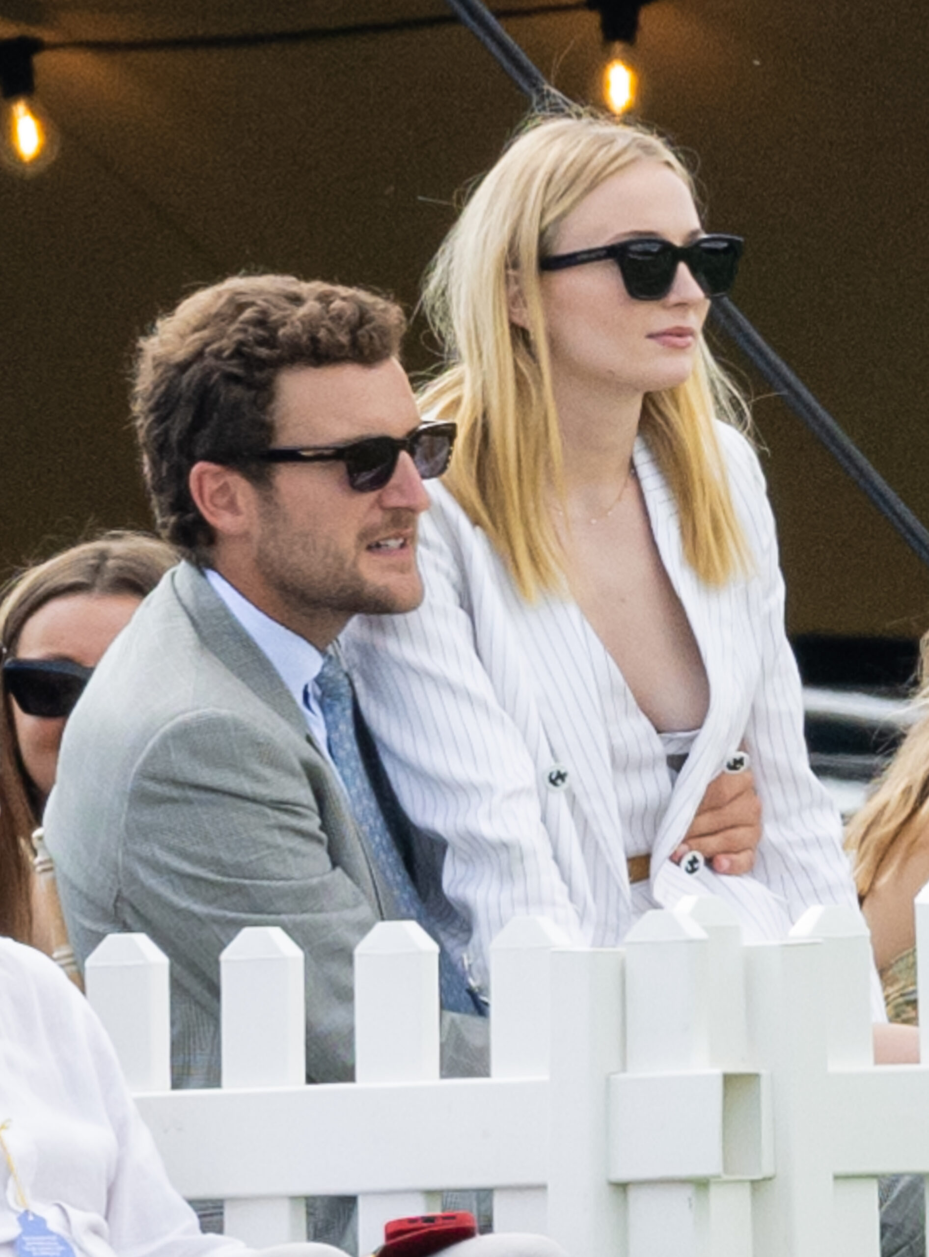 Sophie Turner sitting on Peregrine's lap