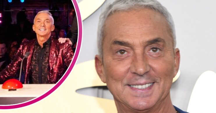Bruno Tonioli smiling and sitting on his BGT desk