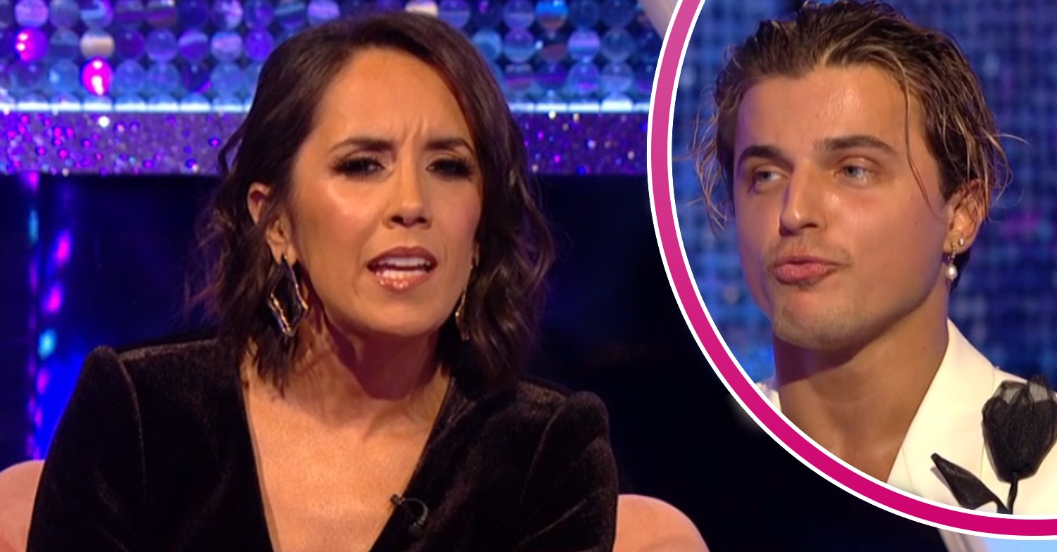 Janette Manrara frowning and Nikita Kuzmin talking on It Takes Two