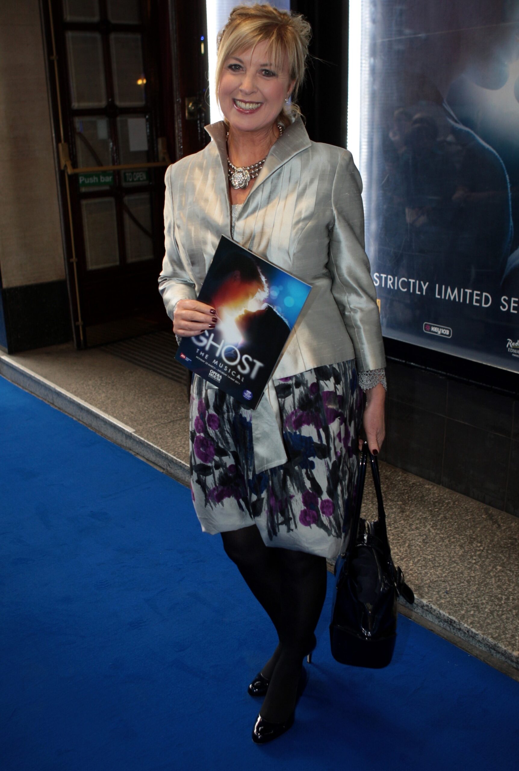 Lucy Meacock smiling at event