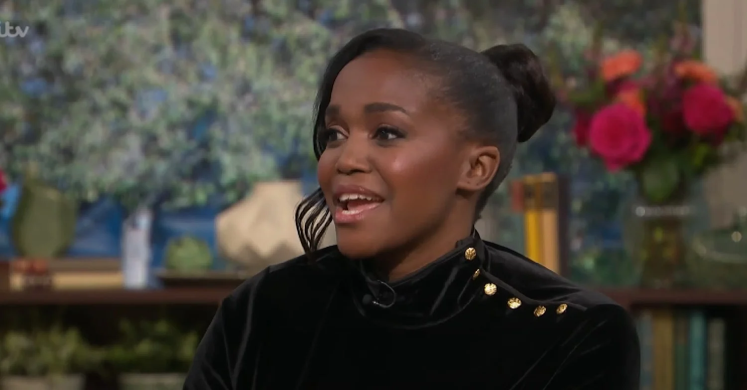 Oti Mabuse speaking on This Morning with hair up