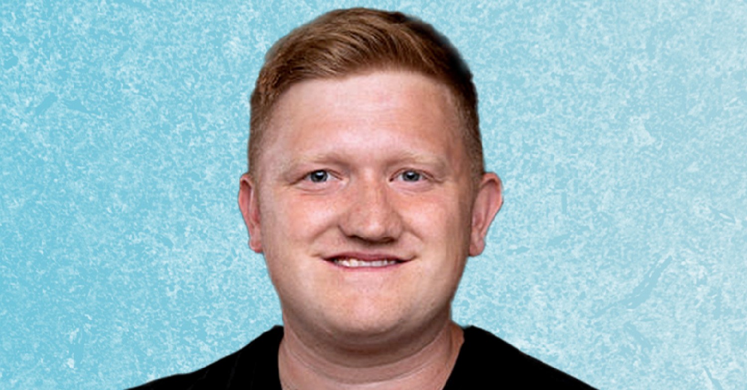 Sam Aston smiling in his Dancing On Ice profile
