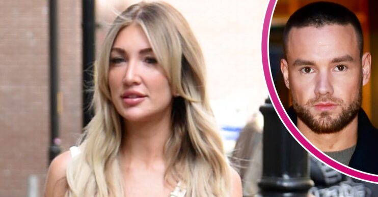 Kate Cassidy frowning beside Liam Payne with a serious expression