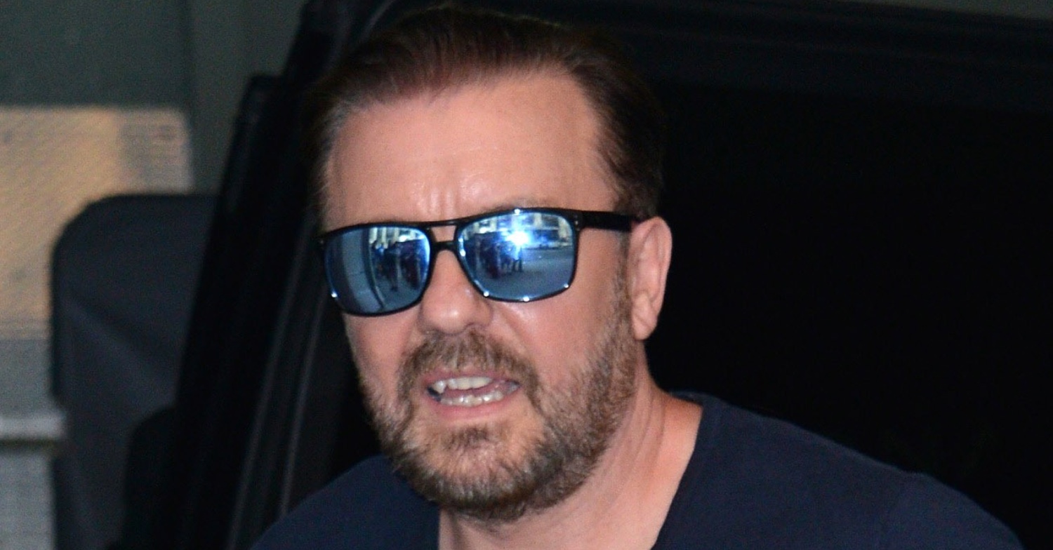 Ricky Gervais talking wearing sunglasses