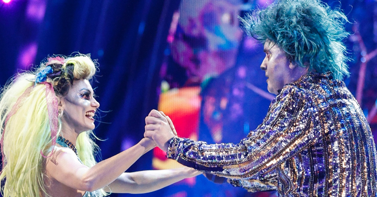 Chris McCausland and Dianne Buswell wearing zombie outfits and dancing on Strictly