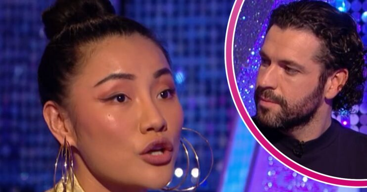 Nancy Xu talking beside Shayne Ward with concerned expression