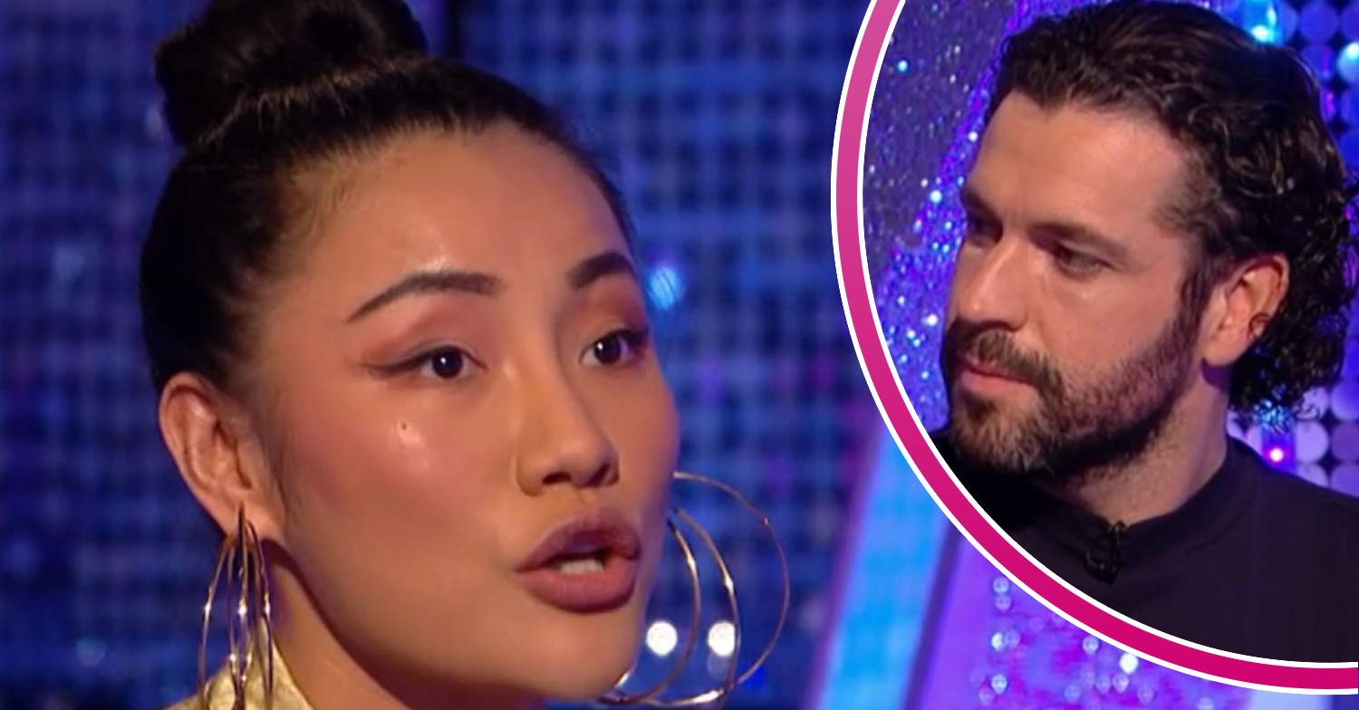 Nancy Xu talking beside Shayne Ward with concerned expression
