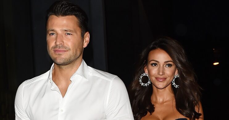Mark Wright and Michelle Keegan looking in front