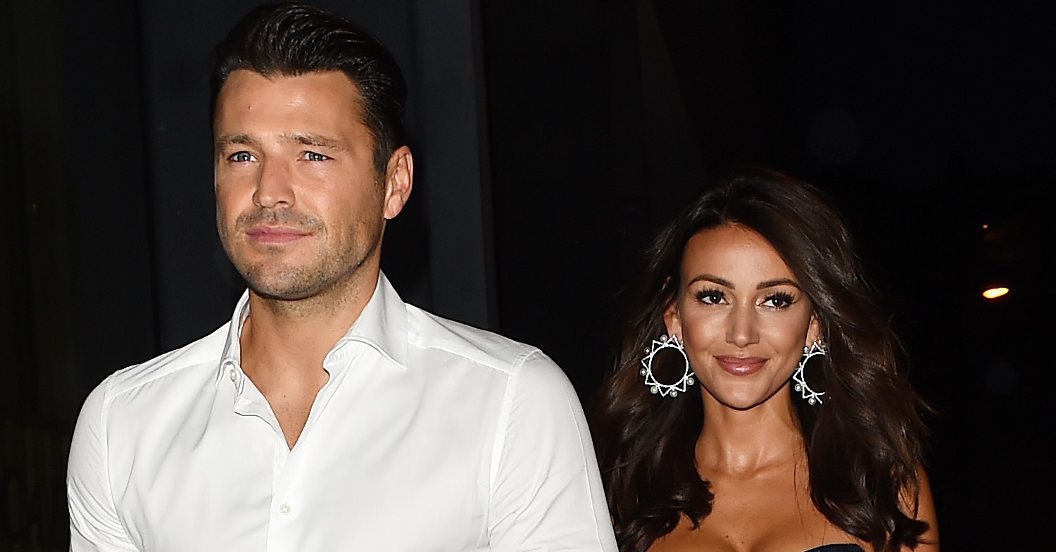 Mark Wright and Michelle Keegan looking in front