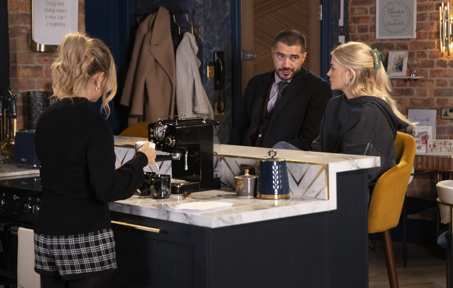 Adam with Bethany and Sarah in the solicitor's office on Corrie