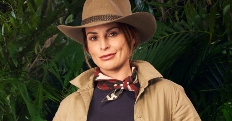 Coleen Rooney in her I'm a Celebrity 2024 profile shoot, featured in Jungle gear against the jungle backdrop.