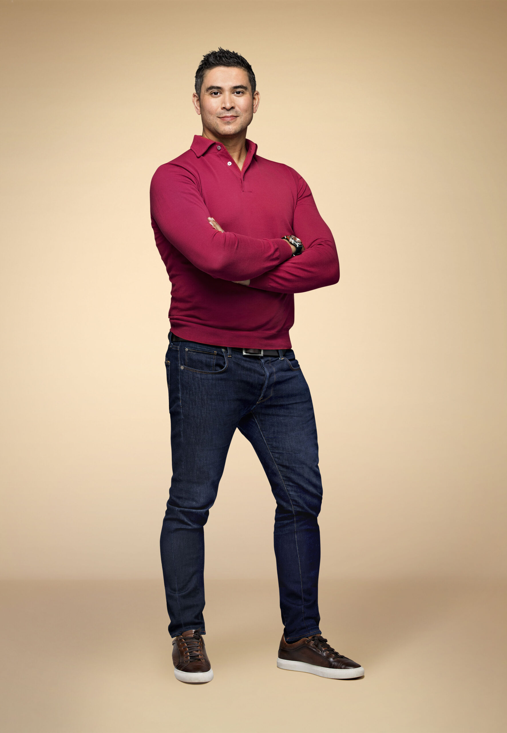 Rav Wilding wearing a pink jumper