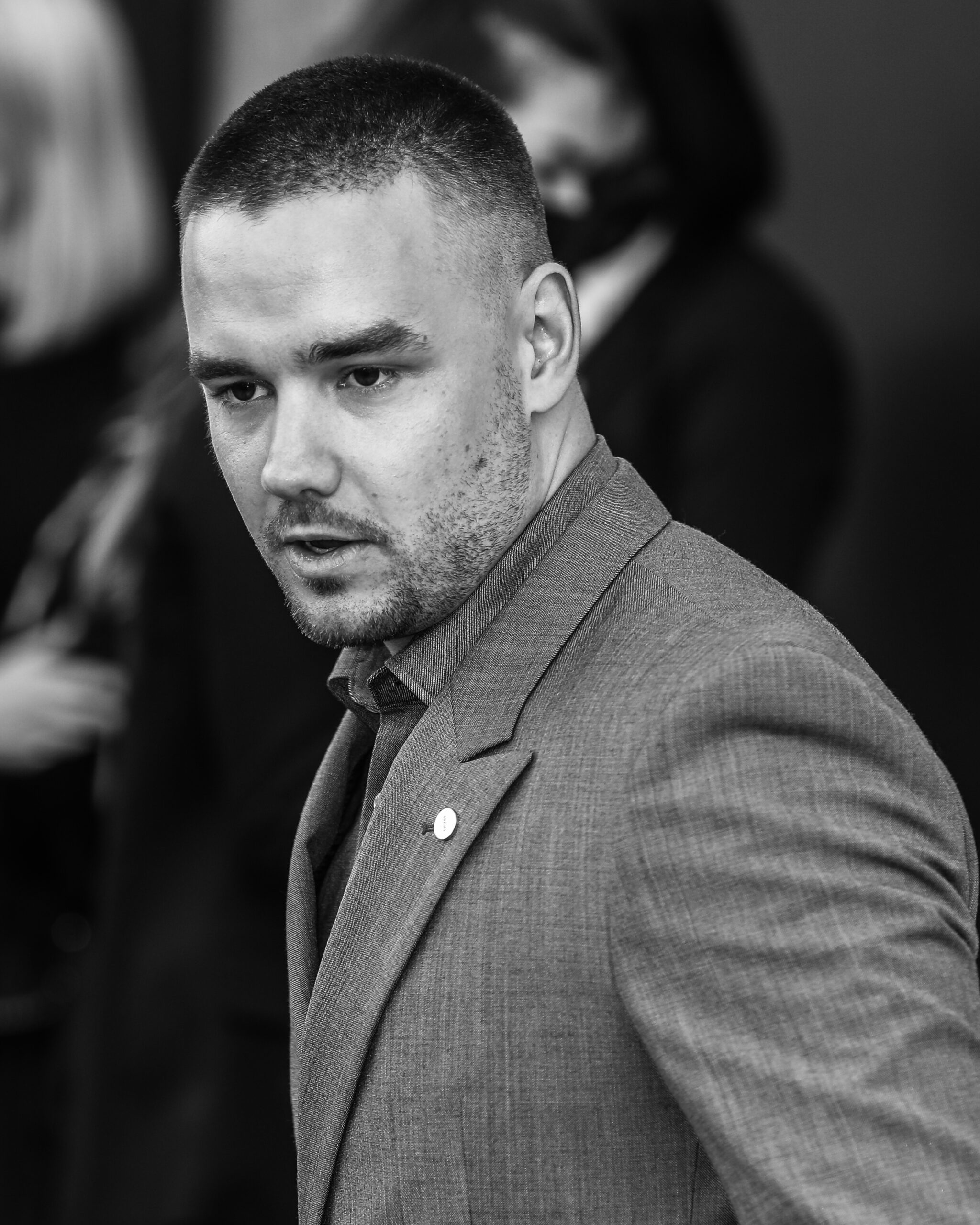 A black and white picture of Liam Payne