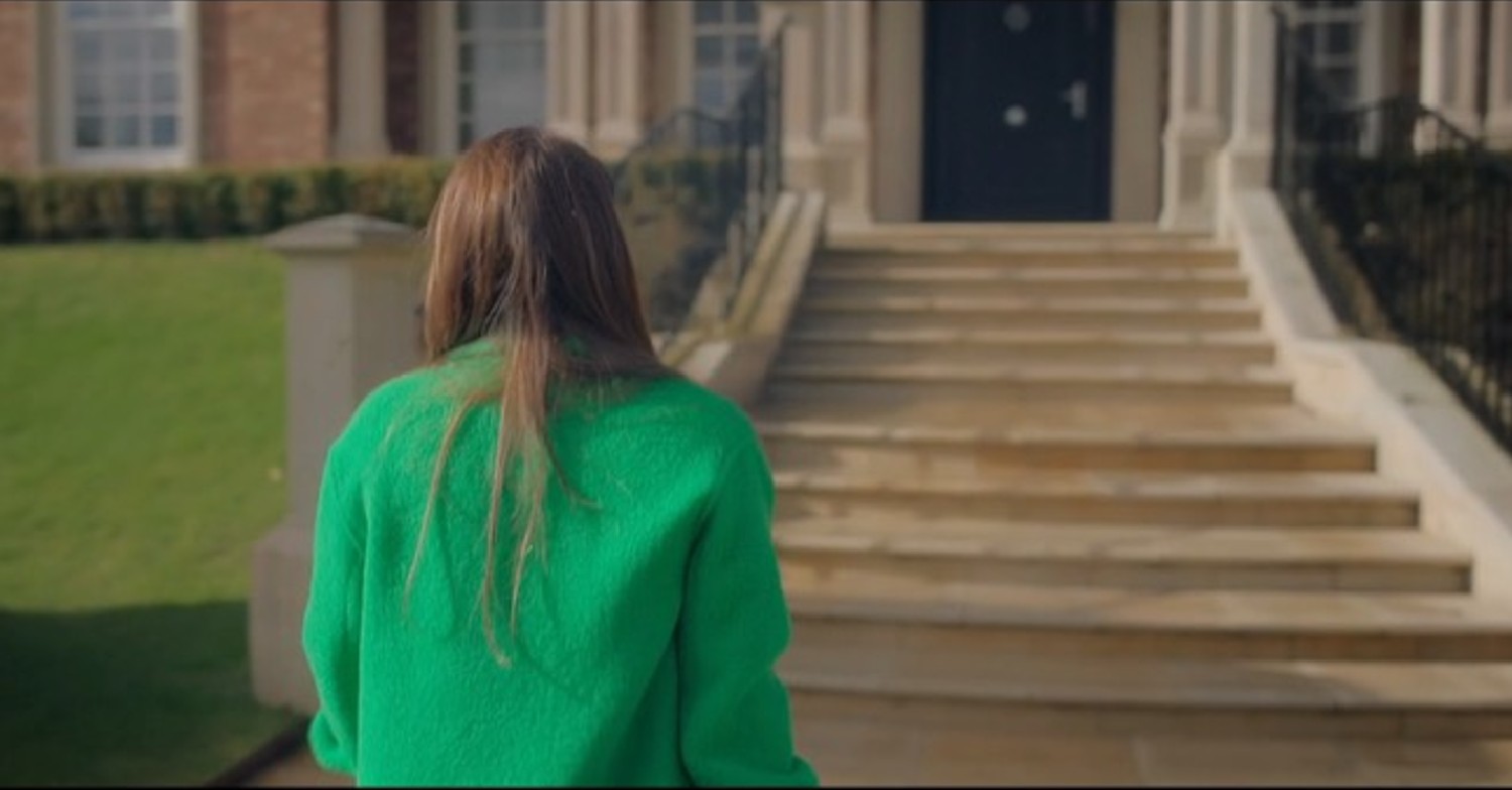 Coleen walking to her house