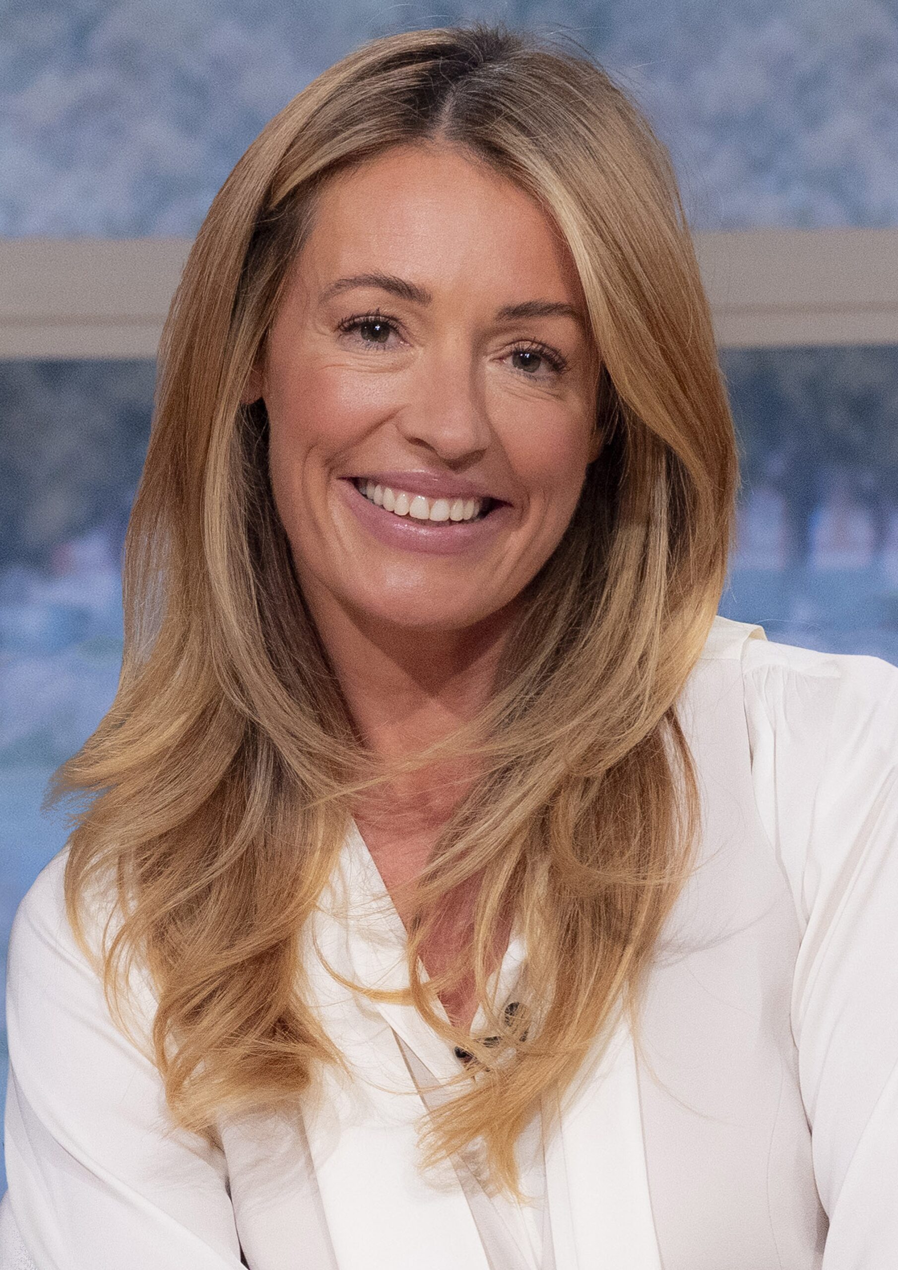 Cat Deeley smiling in This Morning promo picture