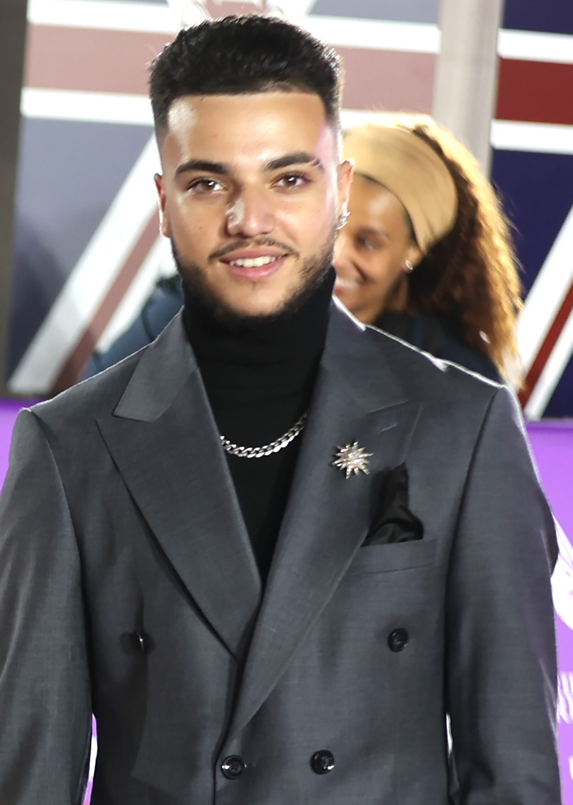 Junior Andre smiling at Pride of Britain Awards
