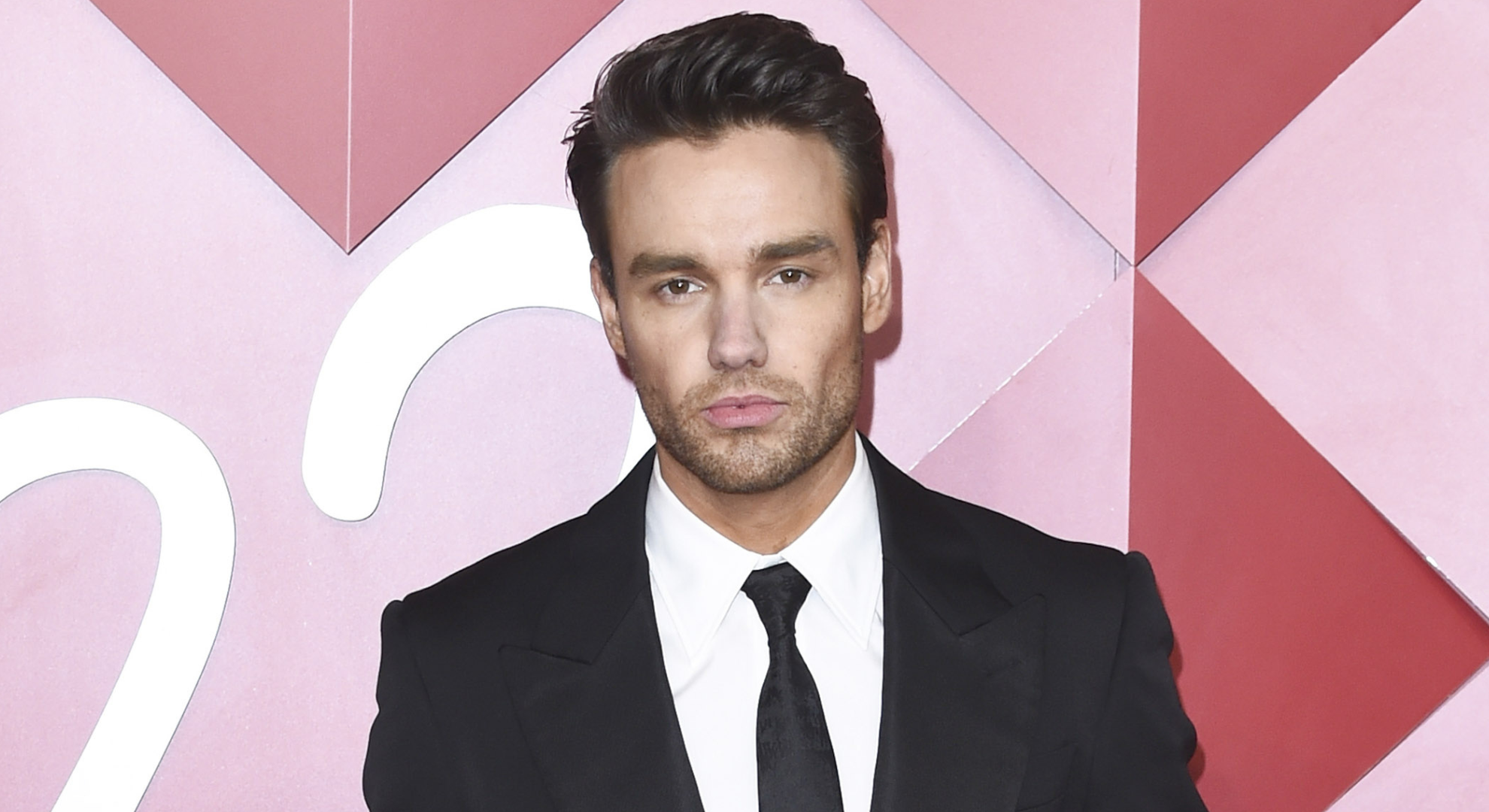 Liam Payne posing at event