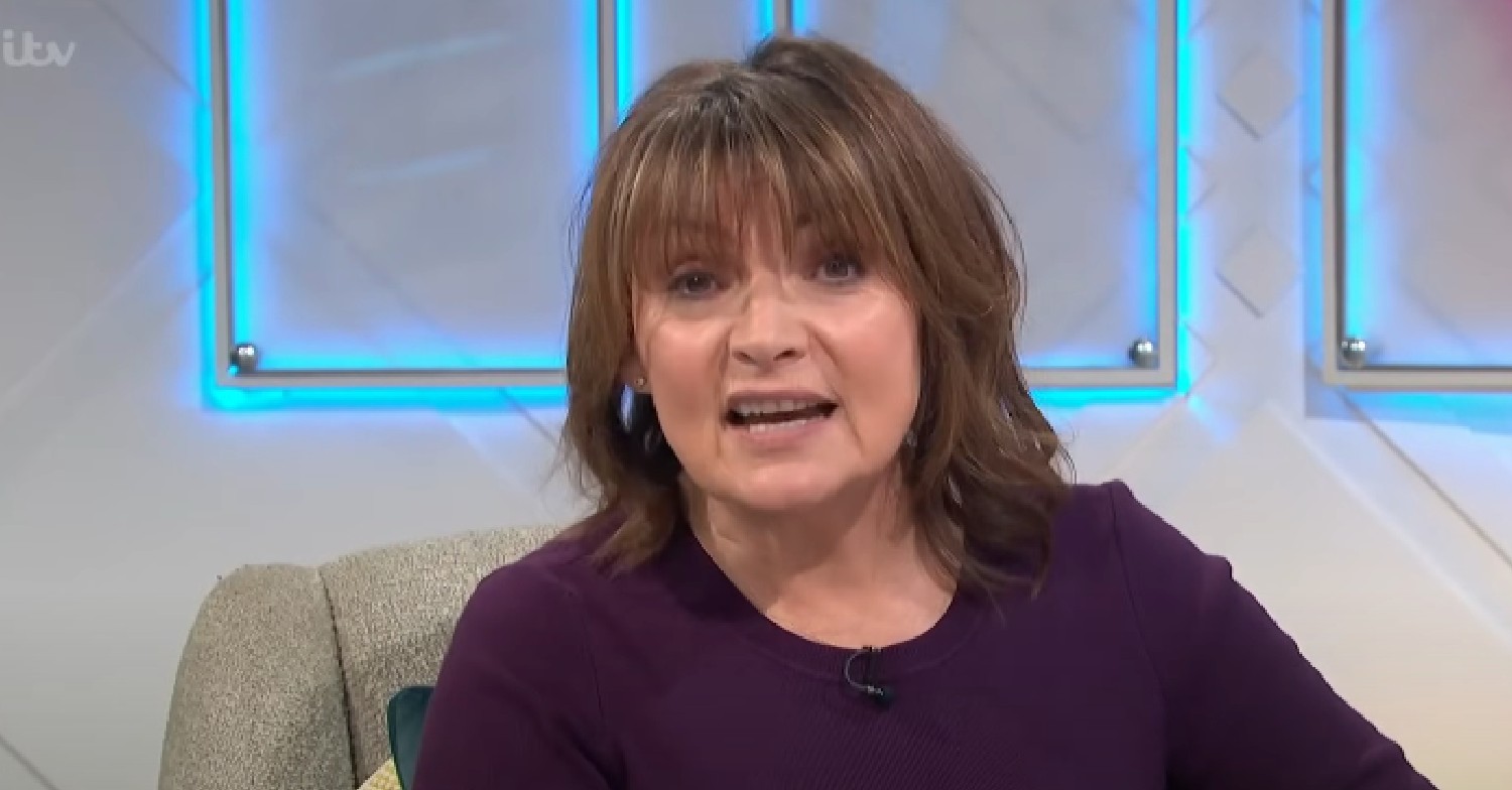 Lorraine Kelly talking in purple top on ITV show