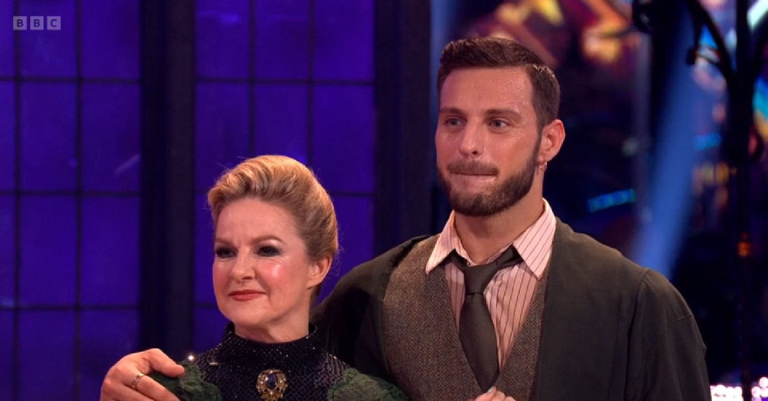 Sarah Hadland and Vito Coppola frowning on Strictly 