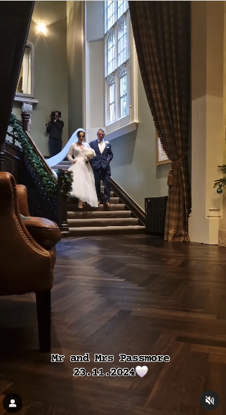 Millie Radford walking down the stairs with dad Noel