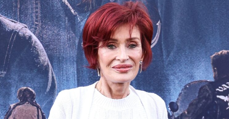 Sharon Osbourne smiling on red carpet at event